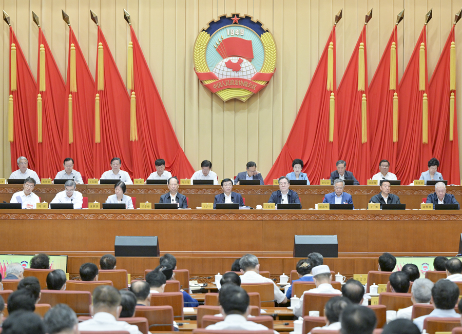全國政協十四屆常委會第三次會議開幕 王滬寧主持 丁薛祥作報告
